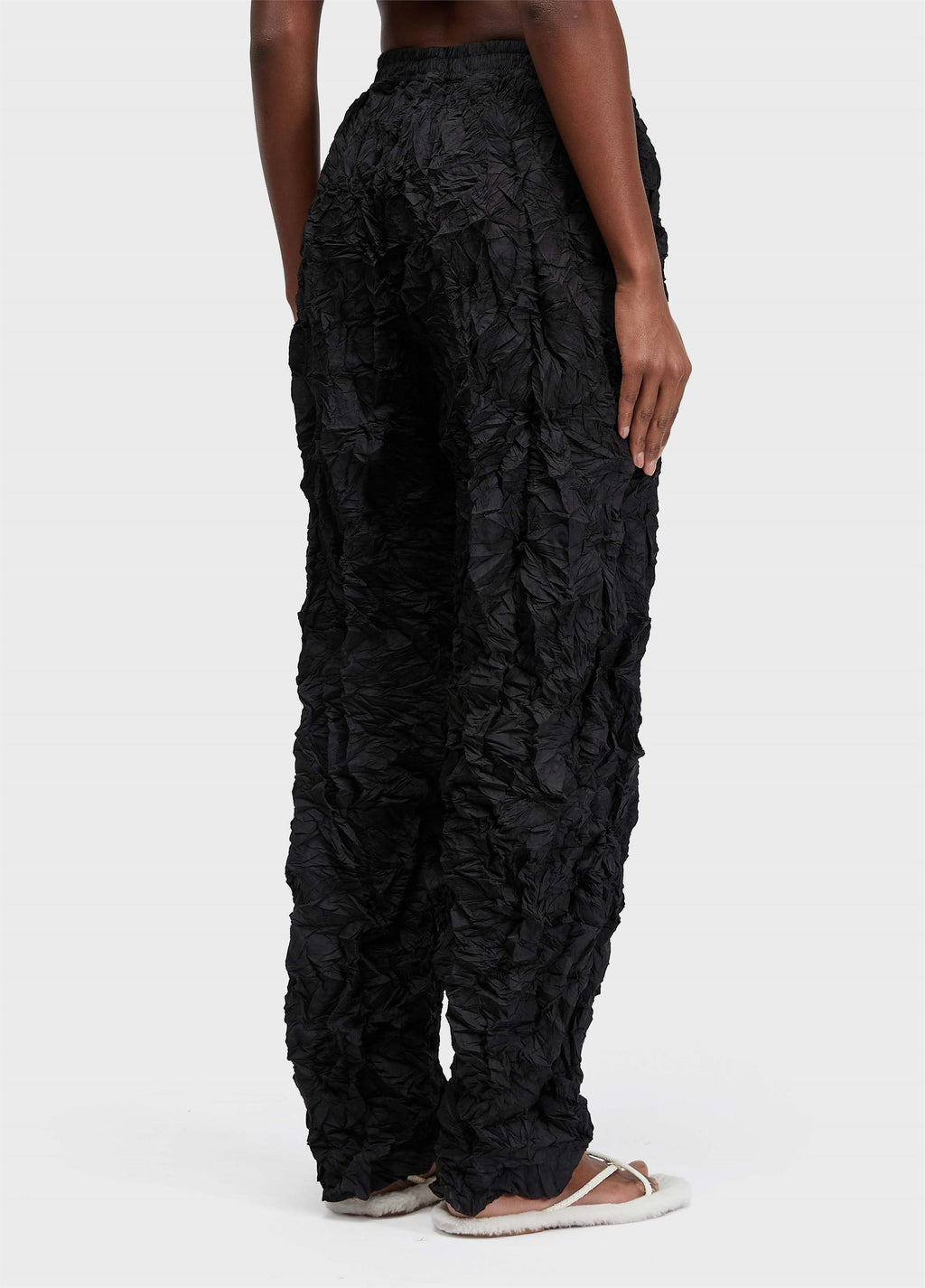 PLEATED TEXTURED TROUSERS