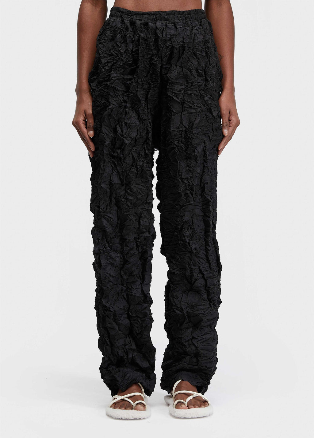 PLEATED TEXTURED TROUSERS