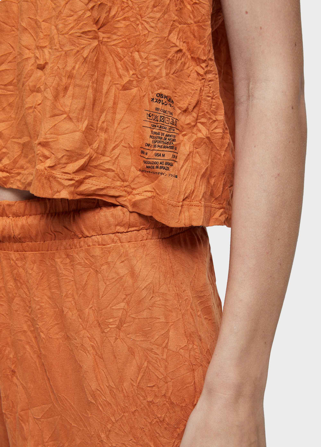 SLEEVELESS RUCHED TOP