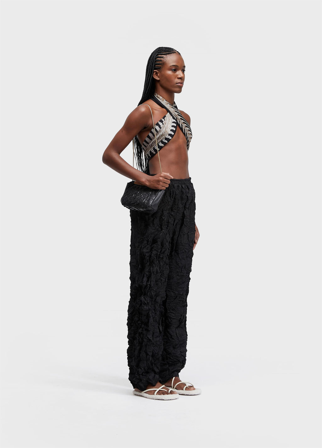 PLEATED TEXTURED TROUSERS