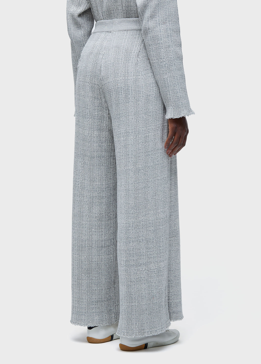 FRAYED KNIT TROUSERS