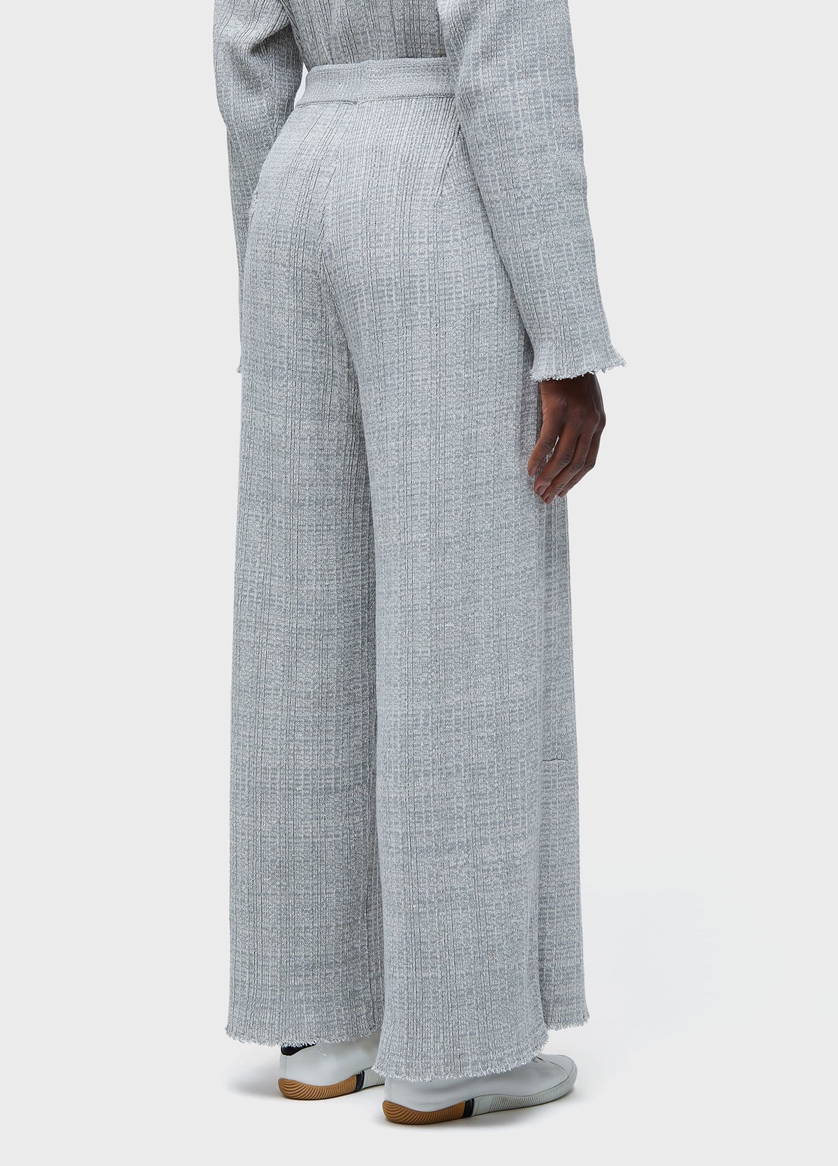 FRAYED KNIT TROUSERS
