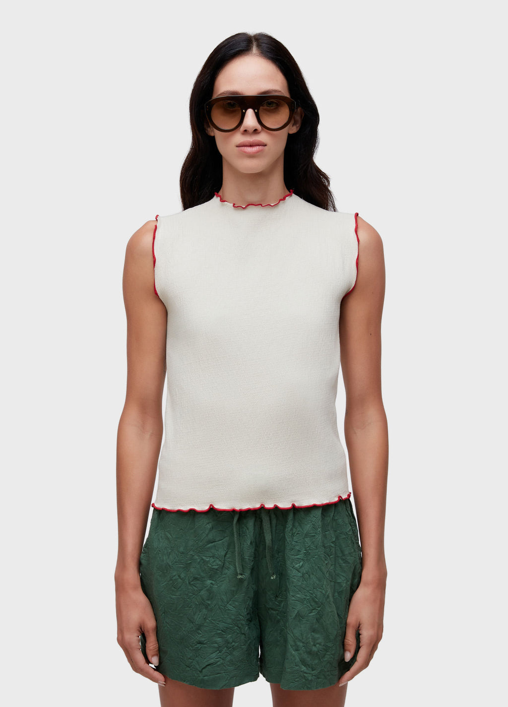 SLEEVELESS VEST