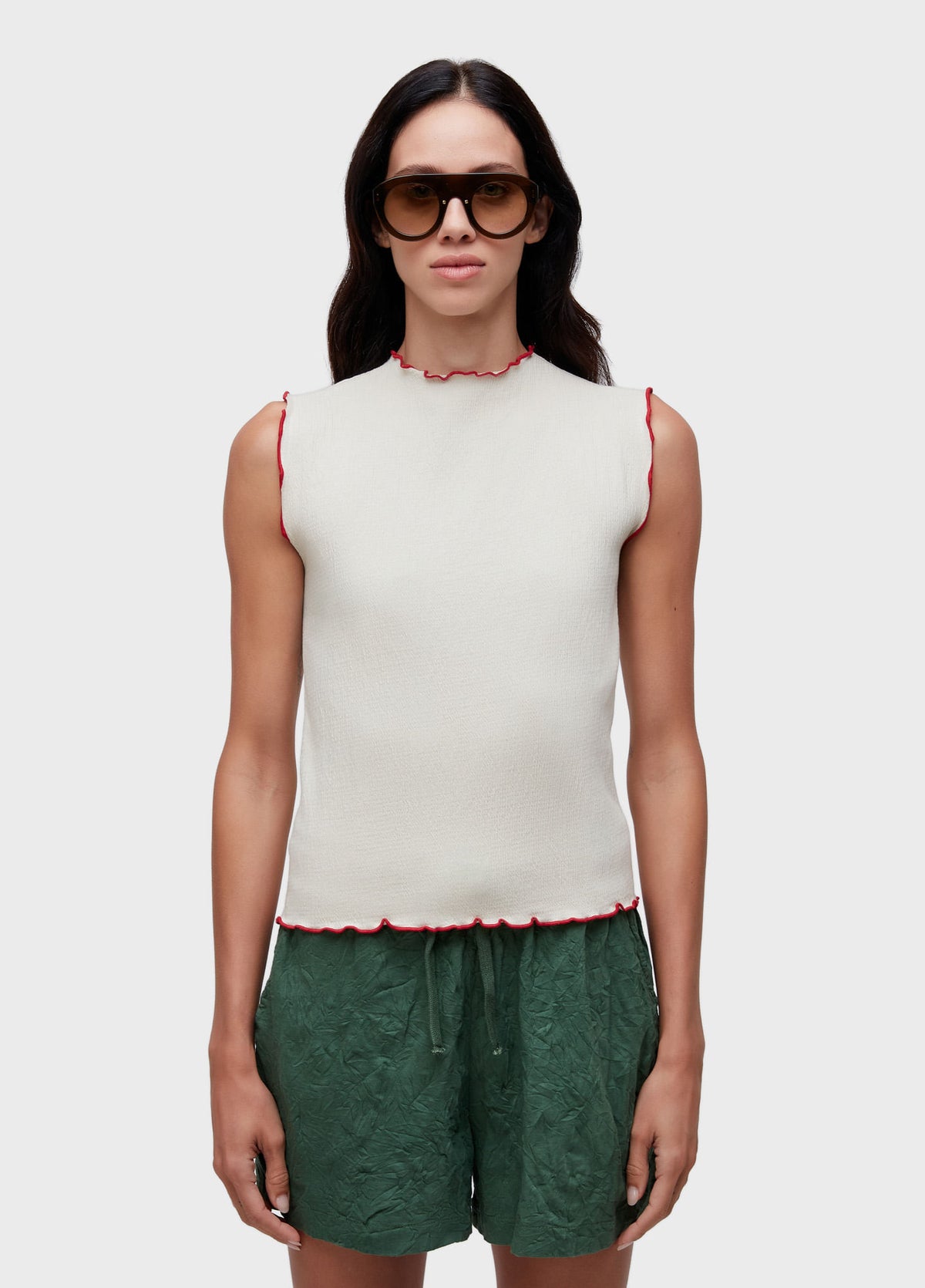 SLEEVELESS VEST