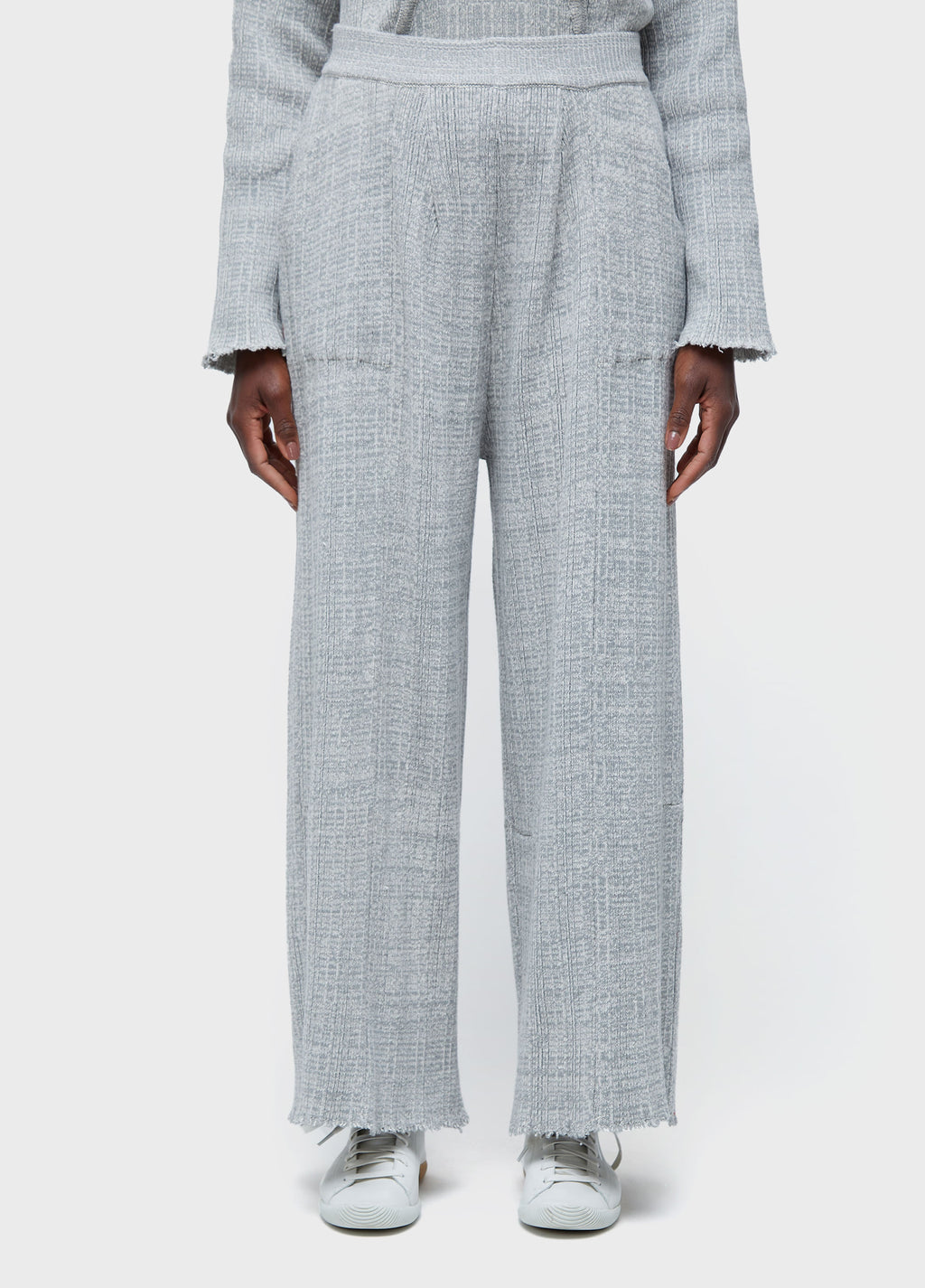 FRAYED KNIT TROUSERS
