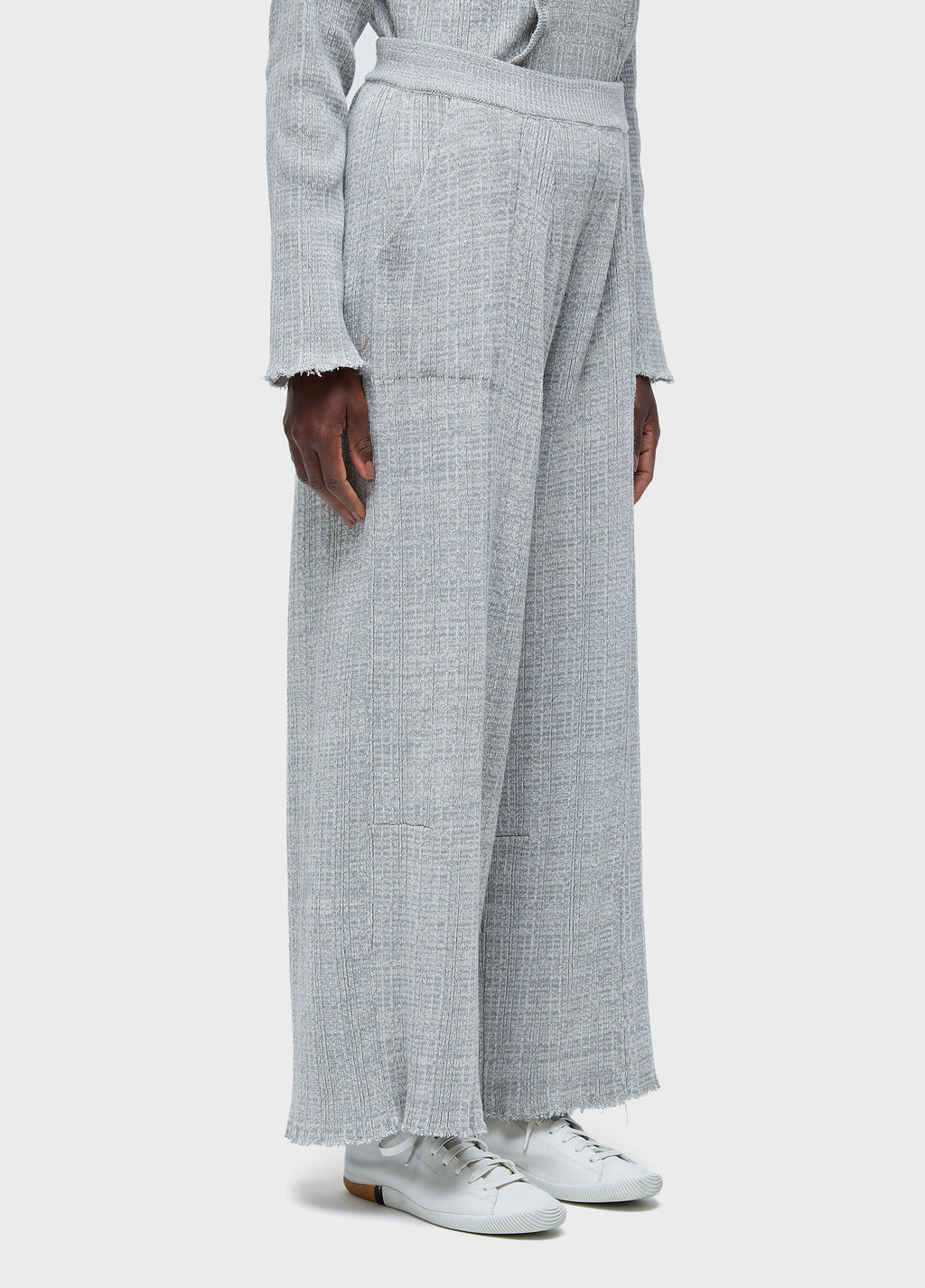FRAYED KNIT TROUSERS