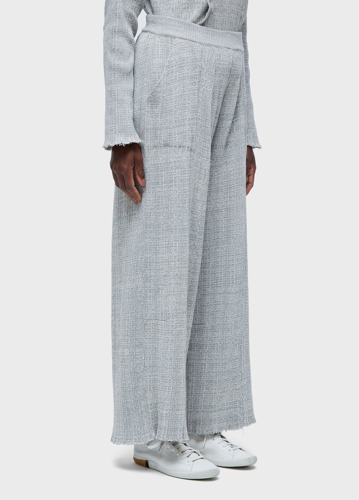 FRAYED KNIT TROUSERS